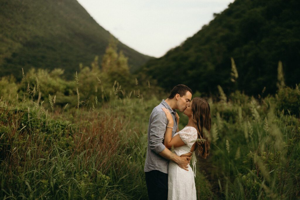 man and woman kissing