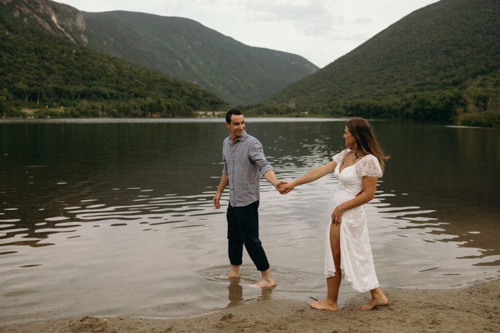 man and woman holding hands 
